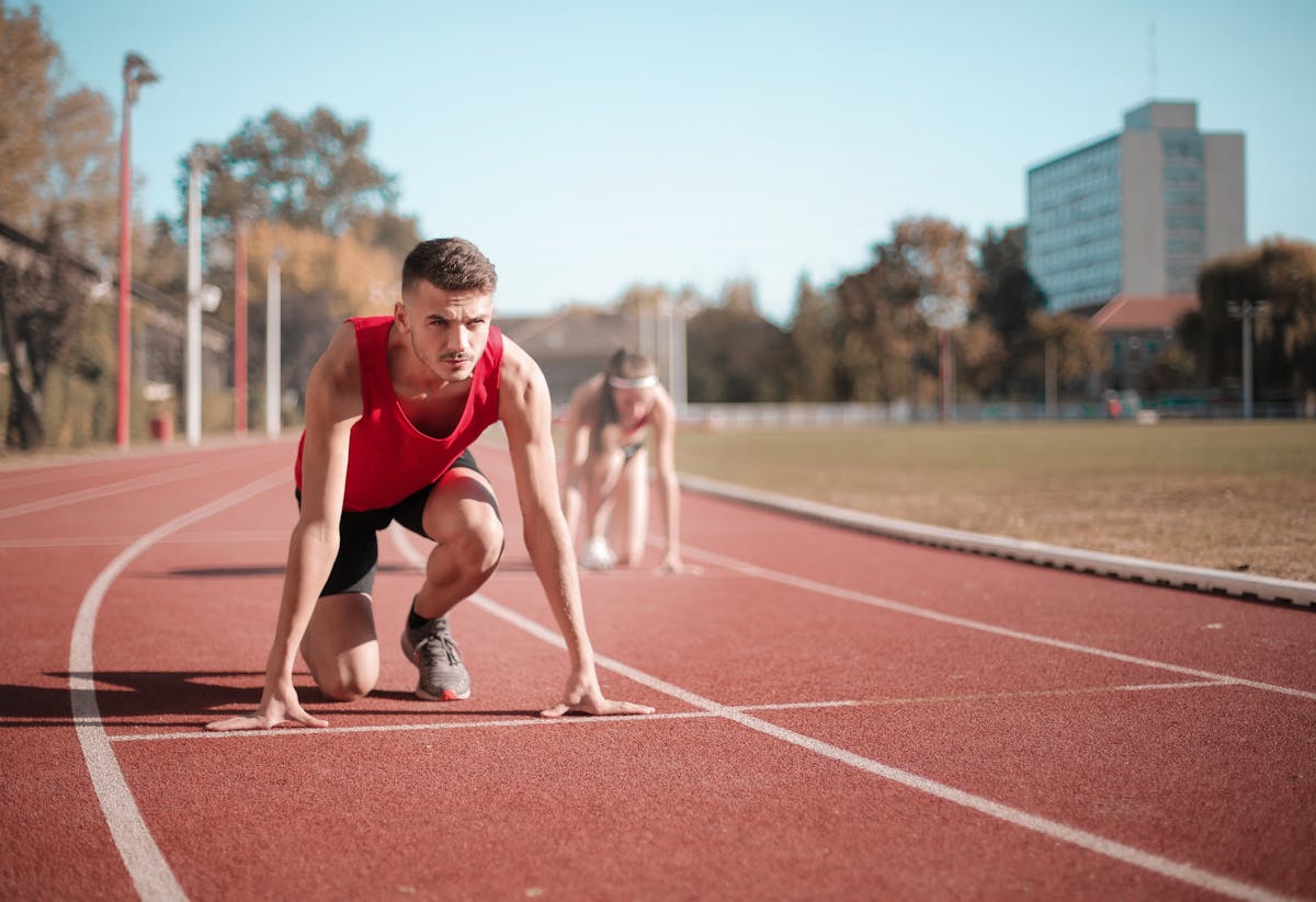 Athlete stretching outdoors before a sports session
